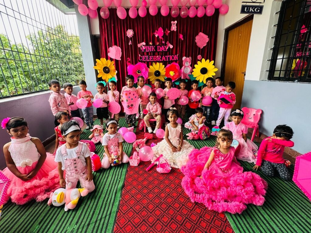 he Colour Pink is the colour of universal love of oneself and of others. Pink is yet a soothing colour that shows care and affection. The light-hearted Colour-Pink represents friendship, harmony, inner peace and approachability with depth and stability. 

 KSR CBSE SCHOOL celebrated *PINK DAY* 
On (13/07/24) with our Busy bees
The young ones came dressed in pink colour and brought pink coloured toys and also there were different cutout done of pink colour . All the pink colour objects, balloons and flower cutout  were displayed in the Corridor and children were introduced to different shades of pink. We also conducted some group activities for the children  just to get the vibes of the celebration.Children had lot of fun by performing the activities and by seeing various types of objects and toys.